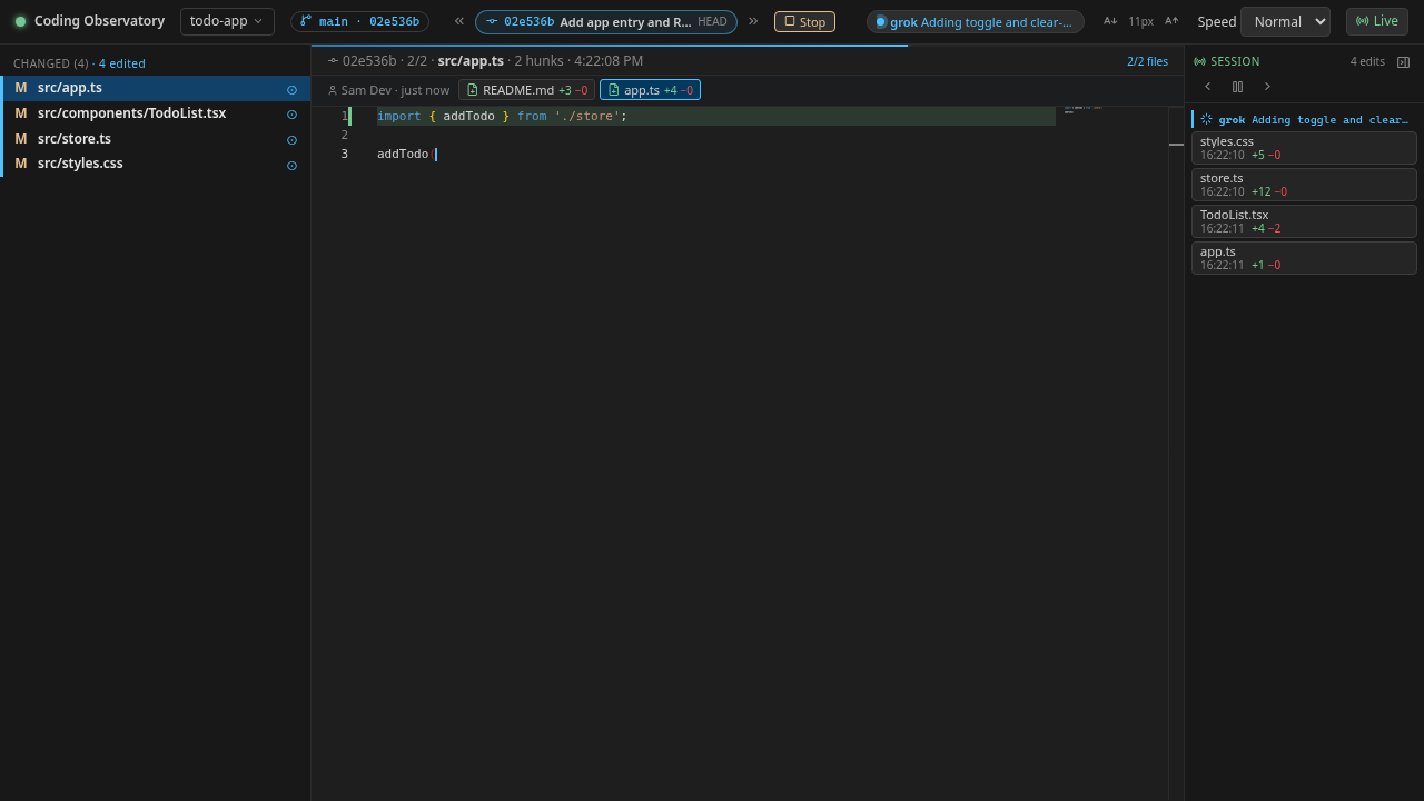 Commit view: the header shows the commit with a Stop button while its files replay, with the progress bar at 2 of 2 files
